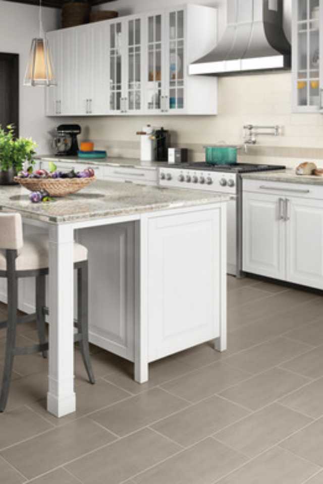 grey tile flooring in kitchen with white accents